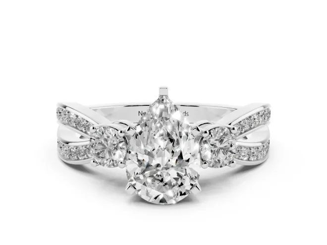 Three-Stone Pear Cut Diamond Twist Band Ring Set in White gold with Pavé Accents and Prong Setting