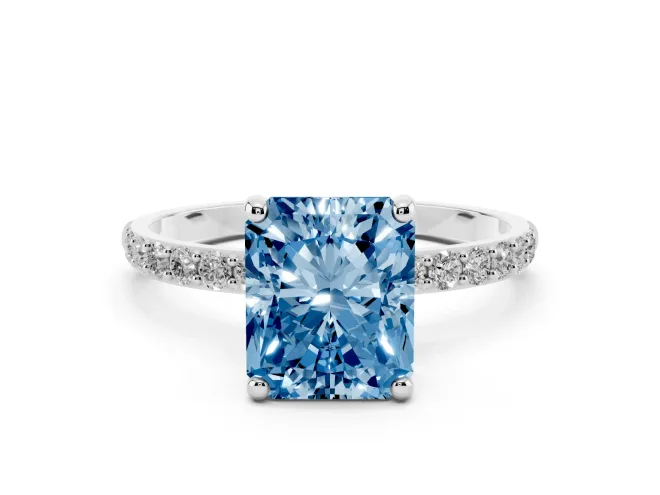 Fancy Blue Radiant Cut Diamond Solitaire Ring Set in White gold with Round Pavé Band and Prong Setting