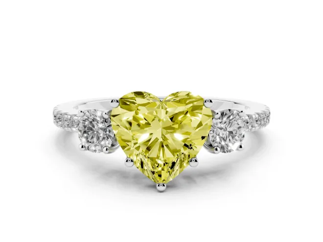 Fancy Yellow Heart Cut Diamond Three-Stone Ring Set in White gold with Pavé Band and Graduated Sides