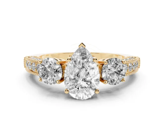 Pear Cut Diamond Three-Stone Ring Set in Yellow gold with Round Side Stones and Pavé Band