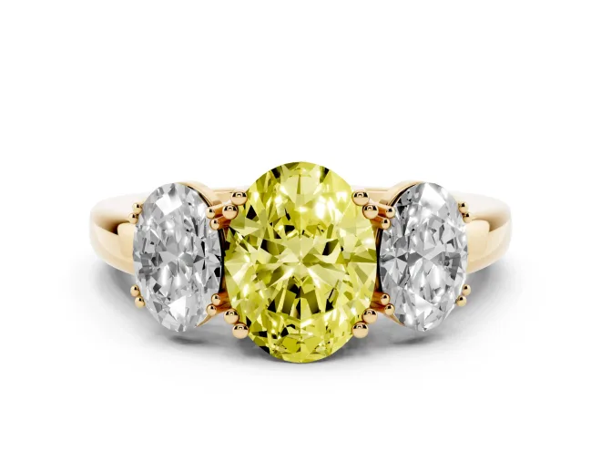 Fancy Yellow Oval Cut Diamond Three-Stone Ring Set in Yellow gold with Polished Band and Prong Setting