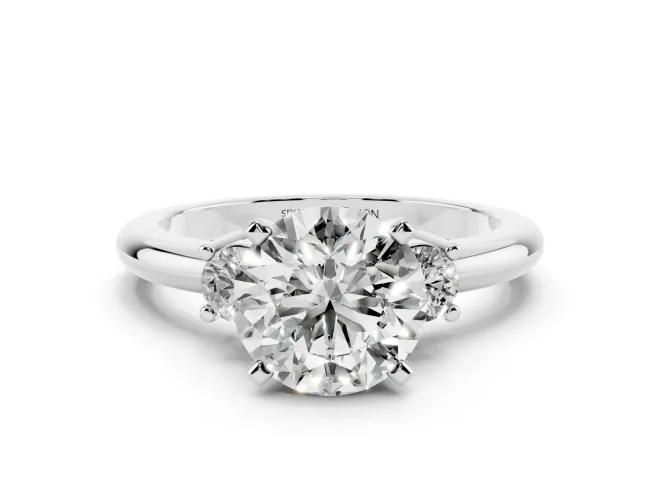 Three-Stone Round Cut Diamond Ring Set in White gold with Prong Setting and Plain Band