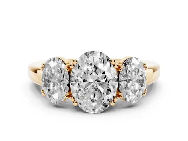 Oval Cut Diamond Three-Stone Ring Set in Yellow gold with Polished Band and Prong Setting