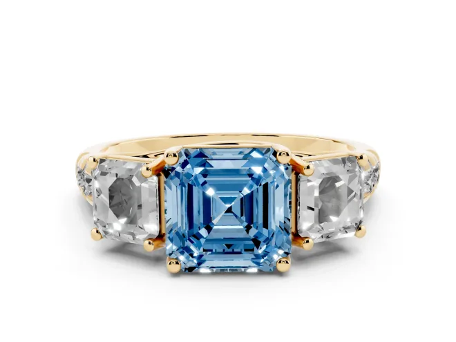 Fancy Blue Asscher Cut Diamond Three-Stone Ring Set in Yellow gold with Pavé Band