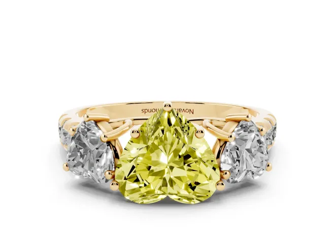 Fancy Yellow Heart Cut Diamond Three-Stone Ring Set in Yellow gold with Pavé Band