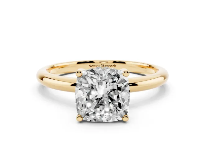 Cushion Cut Diamond Solitaire Engagement Ring Set in Yellow gold with Prong Setting and Polished Band