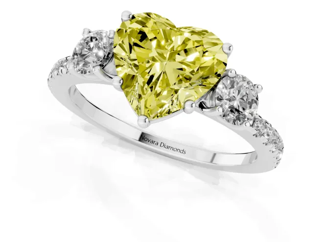 Fancy Yellow Heart Cut Diamond Three-Stone Ring Set in White gold with Pavé Band and Graduated Sides – second view