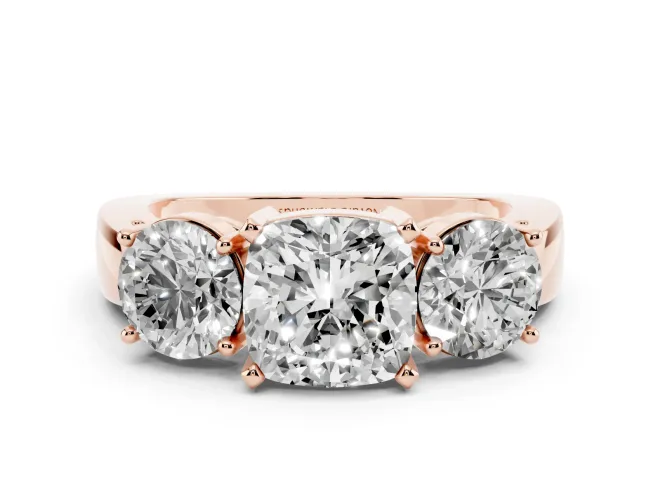Cushion Cut Diamond Three-Stone Ring Set in Rose gold with Round Side Stones and Classic Band