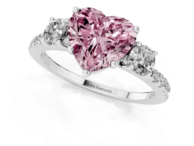 Fancy Pink Heart Cut Diamond Three-Stone Ring Set in Silver with Pavé Band and Graduated Sides – second view