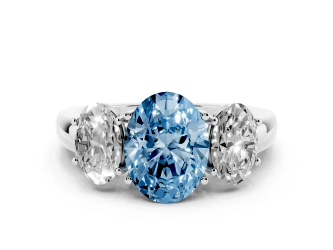 Fancy Blue Oval Cut Diamond Three-Stone Ring Set in Silver with Bold Center and Classic Band