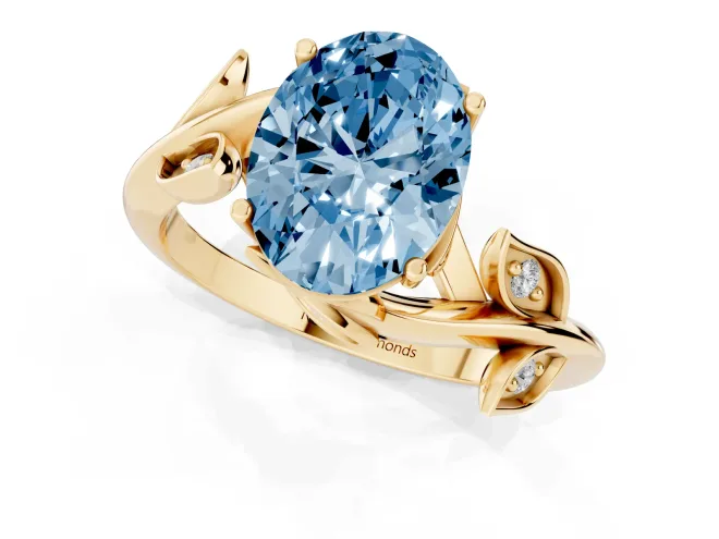 Fancy Blue Oval Cut Diamond Solitaire Twist Engagement Ring Set in Yellow gold with Pavé Leaf Accents – second view