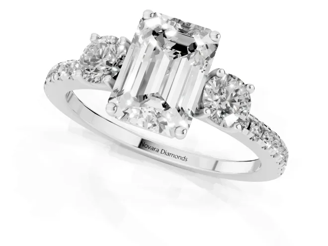 Emerald Cut Diamond Three-Stone Ring Set in White gold with Pavé Band and Graduated Sides – second view