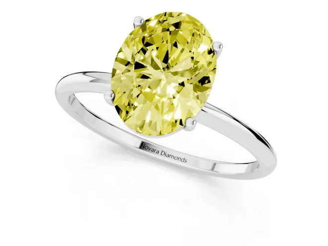 Fancy Yellow Oval Cut Diamond Solitaire Engagement Ring Set in Platinum with Thin Band and Prong Setting – second view