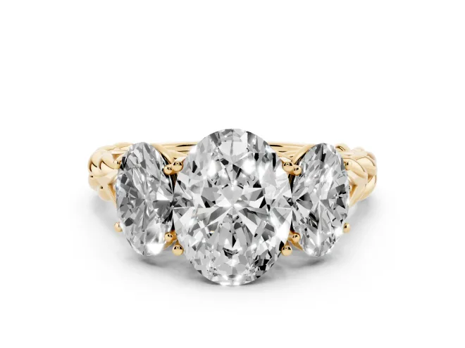Oval Cut Diamond Three-Stone Ring Set in Yellow gold with Braided Band