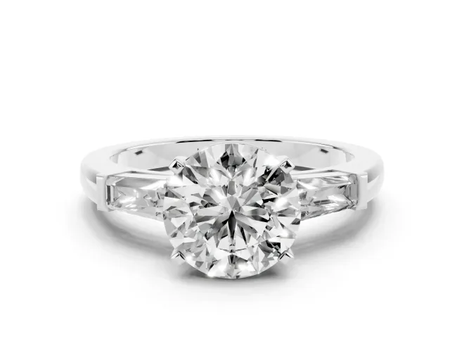 Round Cut Diamond Solitaire Ring Set in White gold with Tapered Baguette Side Stones and Prong Setting