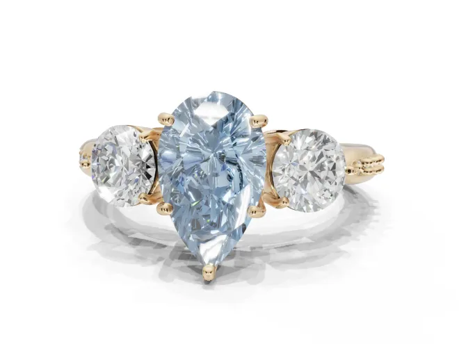 Pear-Shaped Three Stone Engagement Ring Setting for a Fancy Blue Lab-Grown Diamond | Tapered Pavé Band | Yellow Gold