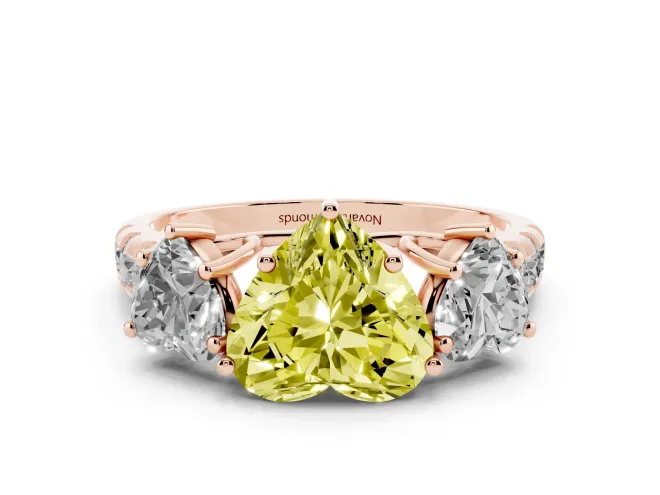 Fancy Yellow Heart Cut Diamond Three-Stone Ring Set in Rose gold with Pavé Band