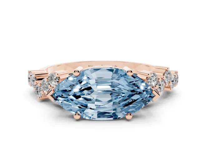 Fancy Blue Marquise Cut Diamond Ring Set in Rose gold with Scattered Round Accents