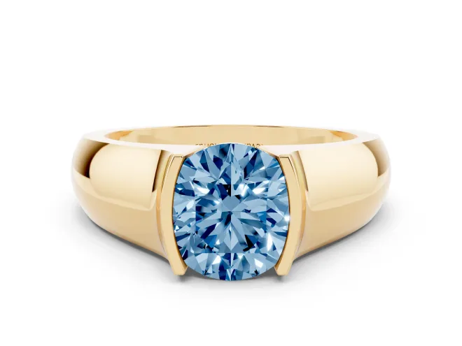 Fancy Blue Round Cut Diamond Bezel Solitaire Ring Set in Yellow gold with Wide Band
