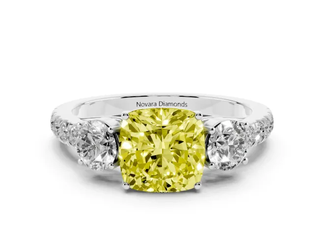 Fancy Yellow Cushion Cut Diamond Three-Stone Ring Set in White gold with Round Side Stones and Delicate Pavé Band