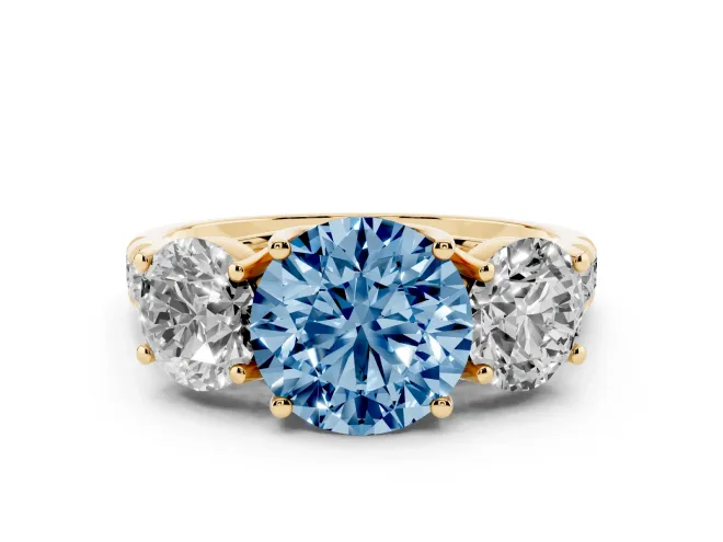 Fancy Blue Round Cut Diamond Three-Stone Ring Set in Yellow gold with Pavé Band