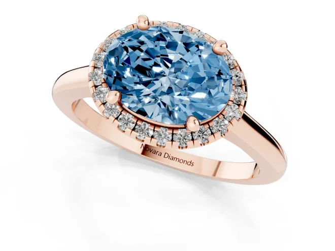 Fancy Blue Oval Cut Diamond Halo Engagement Ring Set in Rose gold with Pavé Band and Rising Shoulders – second view