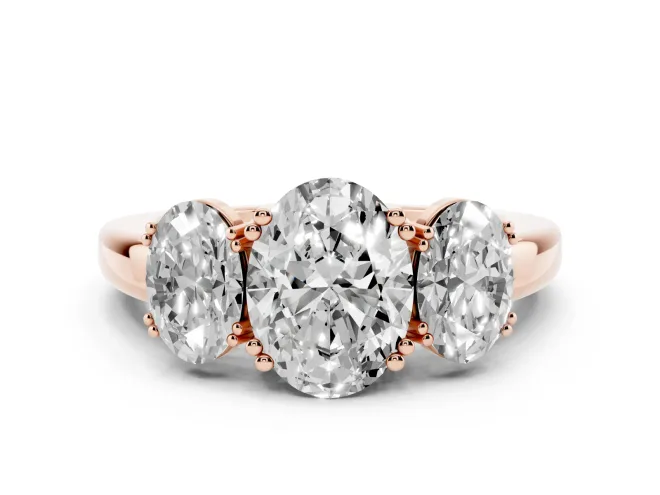 Oval Cut Diamond Three-Stone Ring Set in Rose gold with Polished Band and Prong Setting