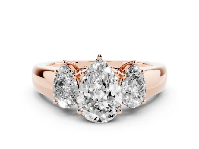 Three-Stone Pear Cut Diamond Ring Set in Rose gold with Matching Prong Settings and Plain Band