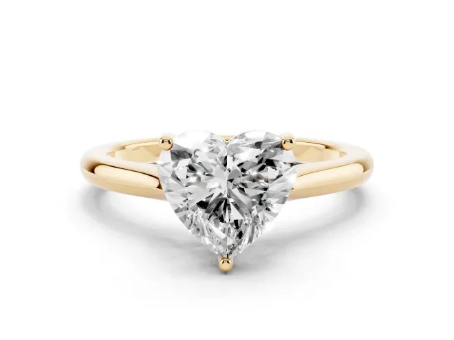 Heart Cut Diamond Solitaire Ring Set in Yellow gold with Cathedral Band and Prong Setting