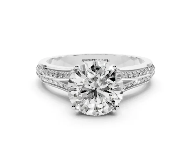 Round Cut Diamond Split Shank Pavé Engagement Ring Set in White gold with Prong-Set Center Stone