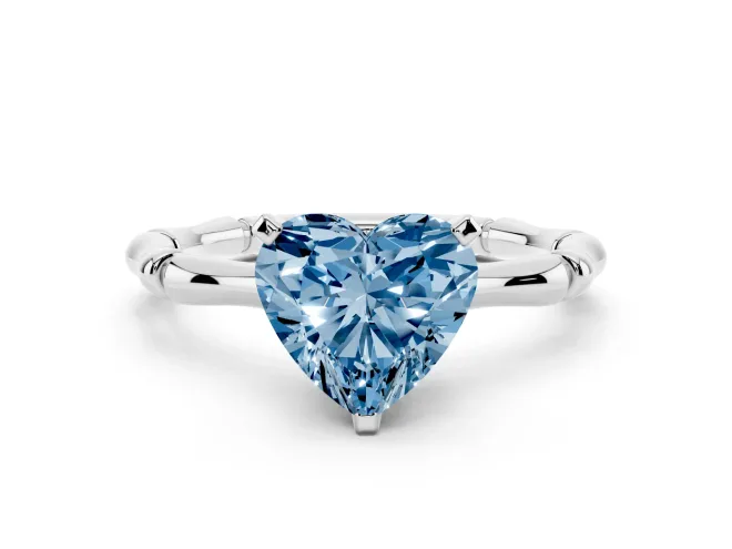 Fancy Blue Heart Cut Diamond Solitaire Ring Set in Silver with Bamboo Band and Prong Setting