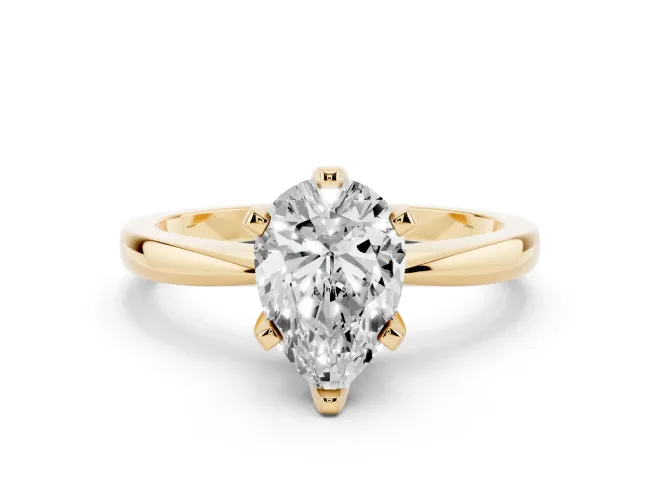 Pear Cut Diamond Solitaire Engagement Ring Set in Yellow gold with Slim Tapered Solitaire Band