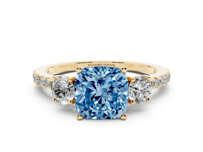 Cushion Cut Three Stone Engagement Ring Setting for a Fancy Blue Lab-Grown Diamond | Pavé Shoulders | Yellow Gold