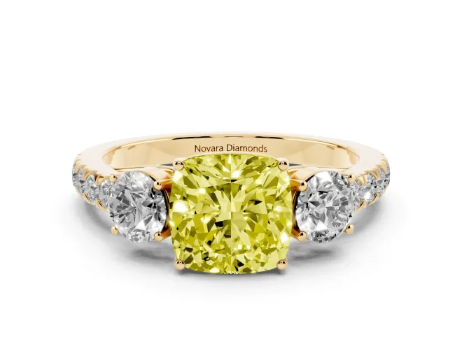 Fancy Yellow Cushion Cut Diamond Three-Stone Ring Set in Yellow gold with Round Side Stones and Delicate Pavé Band