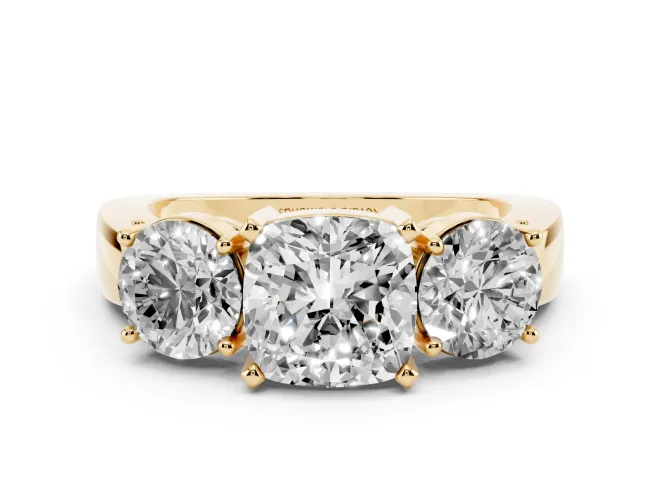 Cushion Cut Diamond Three-Stone Ring Set in Yellow gold with Round Side Stones and Classic Band