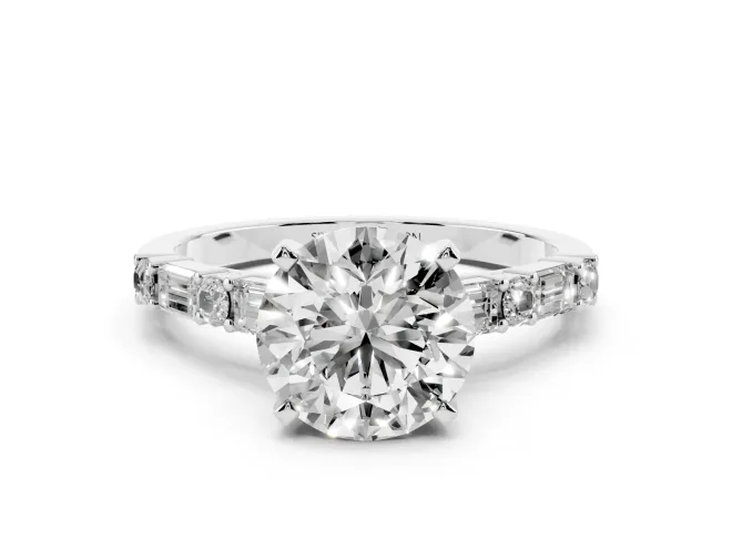 Round Cut Diamond Solitaire Set in White gold with Side Baguettes and Channel Set Band