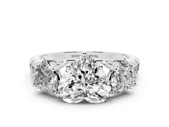 Heart Cut Diamond Three-Stone Ring Set in Silver with Pavé Band