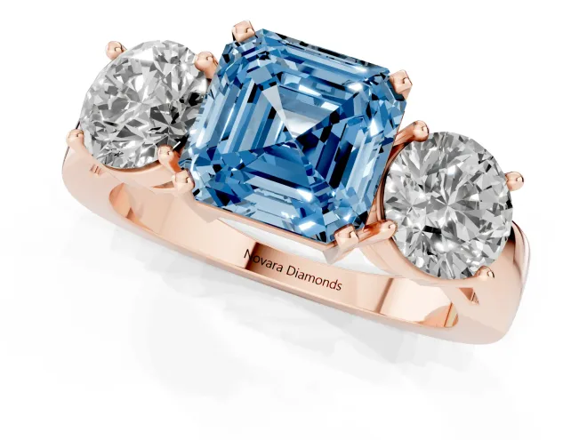 Fancy Blue Asscher Cut Diamond Three-Stone Ring Set in Rose gold with Round Side Stones and Classic Band – second view