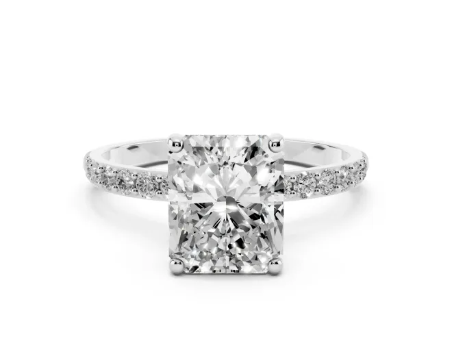 Radiant Cut Diamond Solitaire Ring Set in Platinum with Round Pavé Band and Prong Setting