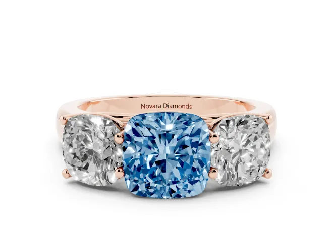 Fancy Blue Cushion Cut Diamond Three-Stone Ring Set in Rose gold with Plain Polished Band