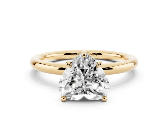 Heart Cut Diamond Solitaire Ring Set in Yellow gold with Thin Band and Prong Setting