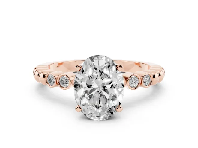 Oval Cut Diamond Solitaire Engagement Ring Set in Rose gold with Bezel Accents on Beaded Band