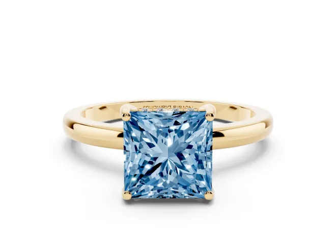 Fancy Blue Princess Cut Diamond Solitaire Ring Set in Yellow gold with Plain Band and Prong Setting