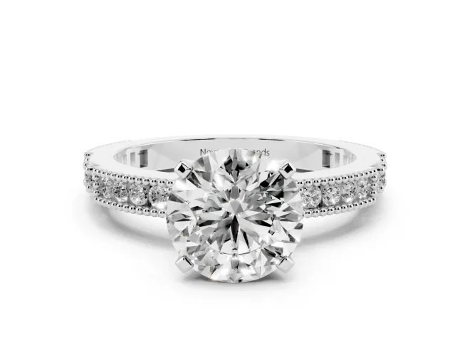 Round Cut Diamond Solitaire Ring Set in White gold with Slim Pavé Band and Prong Setting
