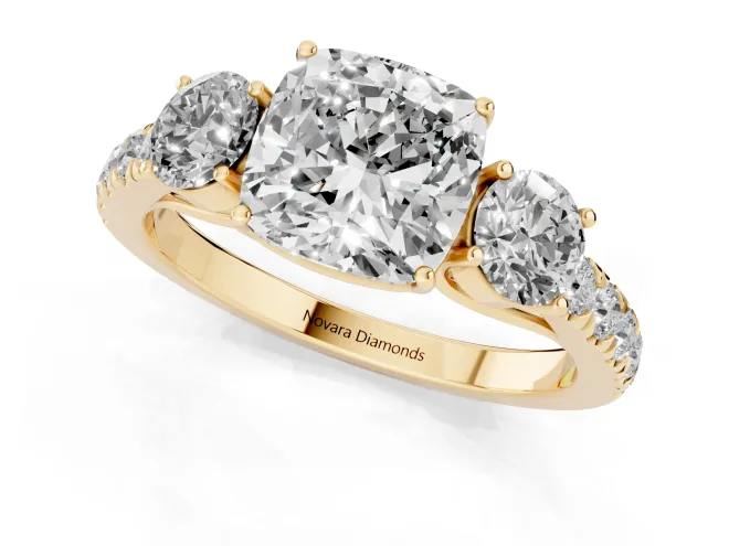 Cushion Cut Diamond Three-Stone Ring Set in Yellow gold with Round Side Stones and Delicate Pavé Band – second view