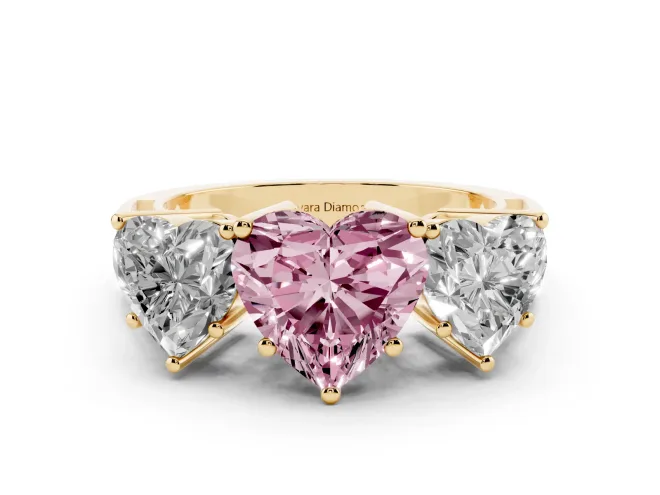 Fancy Pink Heart Cut Diamond Three-Stone Ring Set in Yellow gold with Textured Band