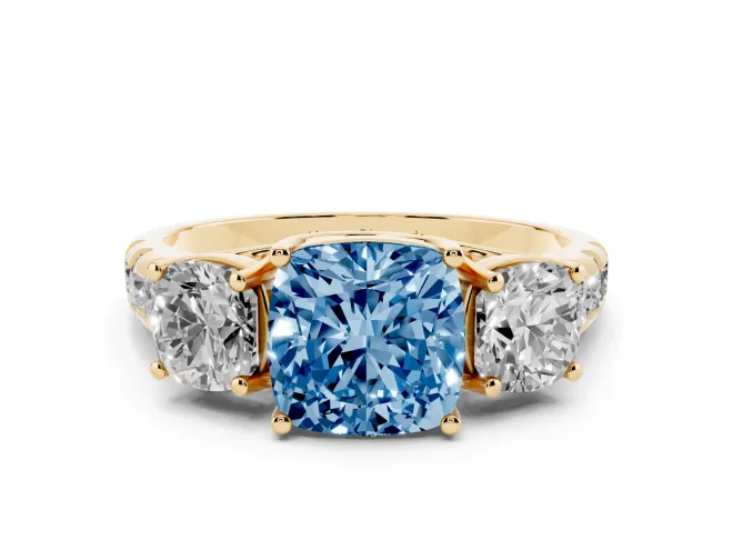 Cushion Cut Three Stone Engagement Ring Setting for a Fancy Blue Lab-Grown Diamond | Accented Shoulders | Yellow Gold