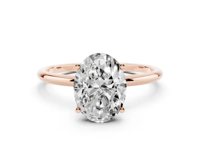 Oval Cut Diamond Solitaire Engagement Ring Set in Rose gold with Thin Band and Prong Setting