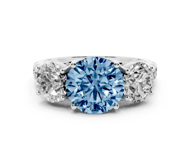 Fancy Blue Round Cut Diamond Three-Stone Ring Set in White gold with Pavé Band