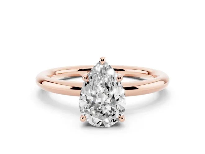 Pear Cut Diamond Solitaire Ring Set in Rose gold with Thin Band and Prong Setting